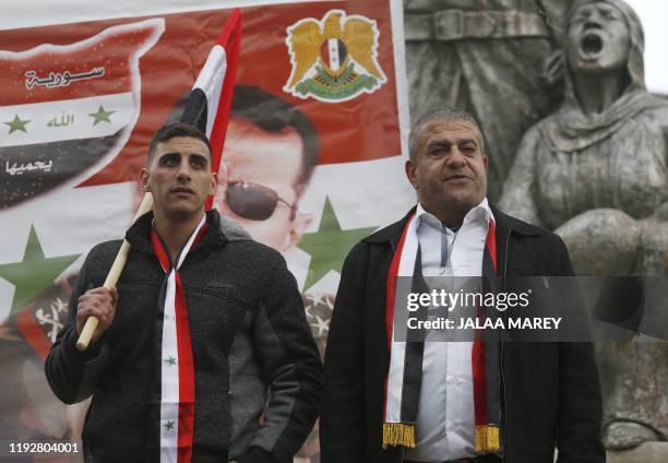 Sidqi al-Maqt and Amal Abu Saleh pose for a picture following their release from a prison in Israel in the Druze village of Majdal Shams in the...