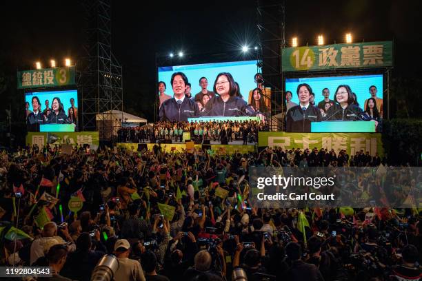 Taiwan's current president and Democratic Progressive Party presidential candidate, Tsai Ing-wen speaks during a rally ahead of Saturday's...