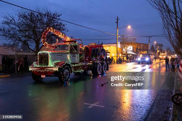 log truck sweet home annual lighted christmas parade - patriotic christmas stock pictures, royalty-free photos & images