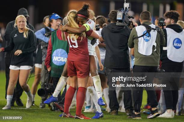 Katie Meyer and Naomi Girma of the Stanford Cardinal celebrate during a game between UNC and Stanford Soccer W at Avaya Satdium on December 8, 2019...