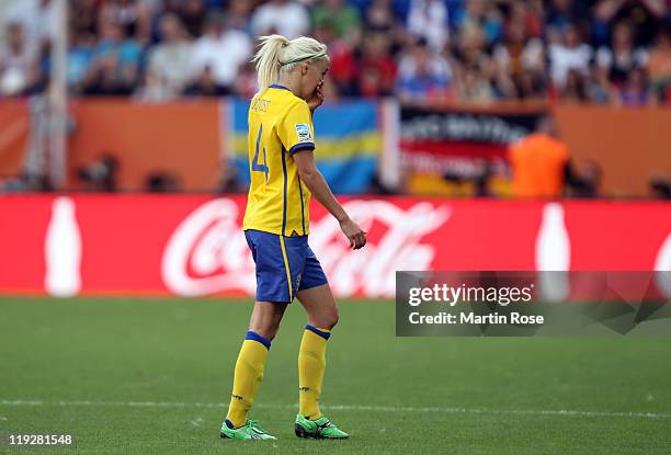 Josefine Oqvist of Sweden walks off the pitch after she gets the red card during the FIFA Women's World Cup 2011 3rd place playoff match between...