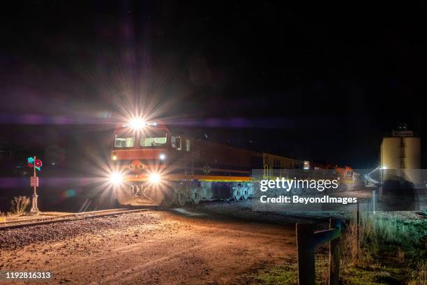 the last train to wudinna has almost gone - train yard at night stock pictures, royalty-free photos & images