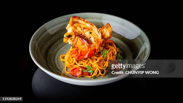 boiled lobster with cheese served with spaghetti - linguini stock pictures, royalty-free photos & images