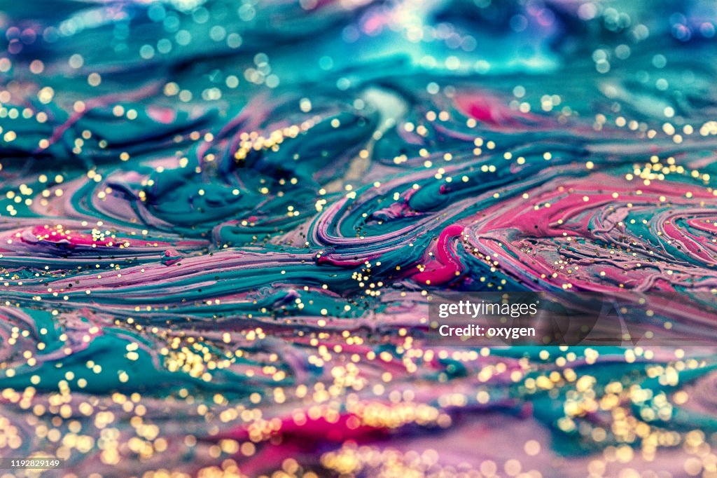 Abstract Colorful Liquid Oil Acrylic Glitter Marbled Background