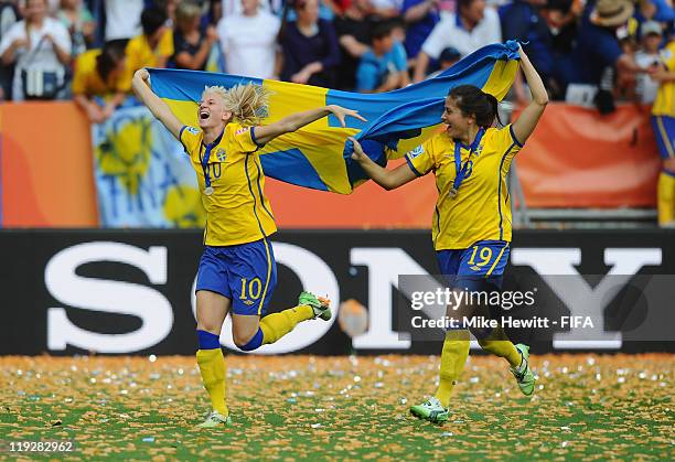 Sofia Jakobsson and Madelaine Edlund of Sweden celebrate victory in the FIFA Women's World Cup 2011 3rd Place Playoff between Sweden and France at...