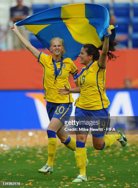 Sofia Jakobsson and Madelaine Edlund of Sweden celebrate victory in the FIFA Women's World Cup 2011 3rd Place Playoff between Sweden and France at...