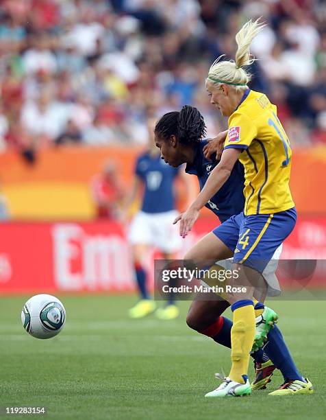 Josefine Oqvist of Sweden and Laura Georges of France battle for the ball during the FIFA Women's World Cup 2011 3rd place playoff match between...