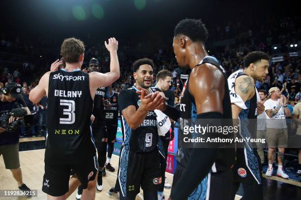 Corey Webster of the Breakers celebrates with teammate Scotty Hopson after winning the round 10 NBL match between the New Zealand Breakers and the...