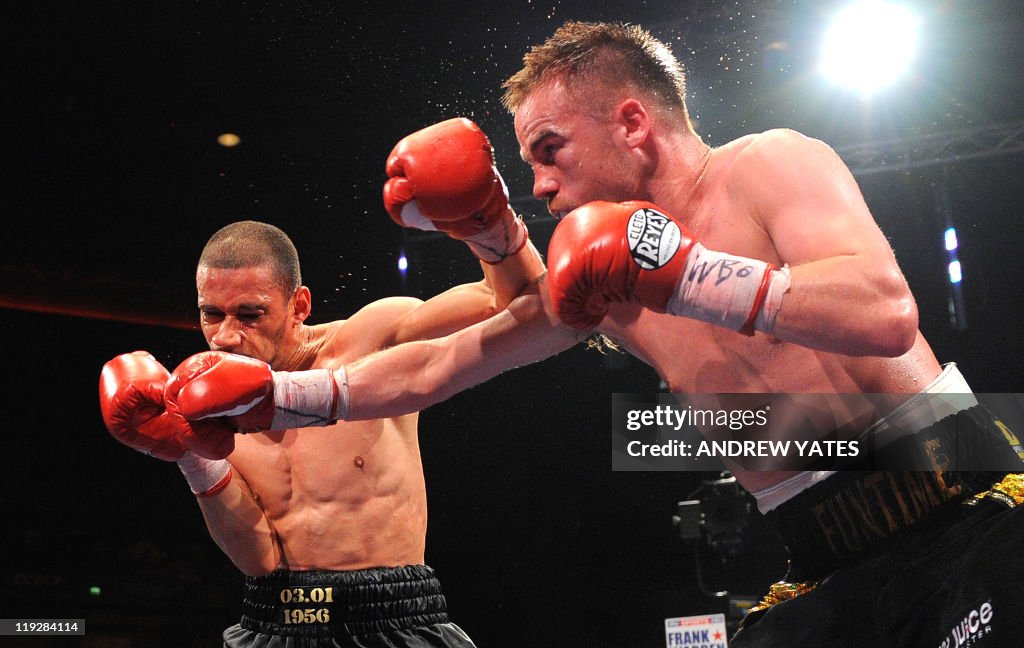 Britains Frankie Gavin (R) competes agai