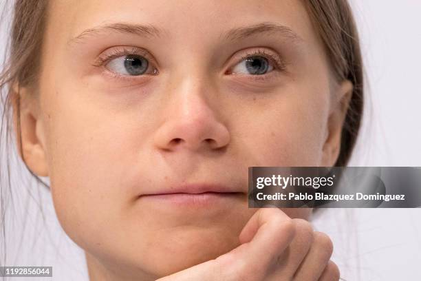 Swedish environment activist Greta Thunberg looks on during a press conference ‘with Fridays For Future movement’ at the COP25 Climate Conference on...