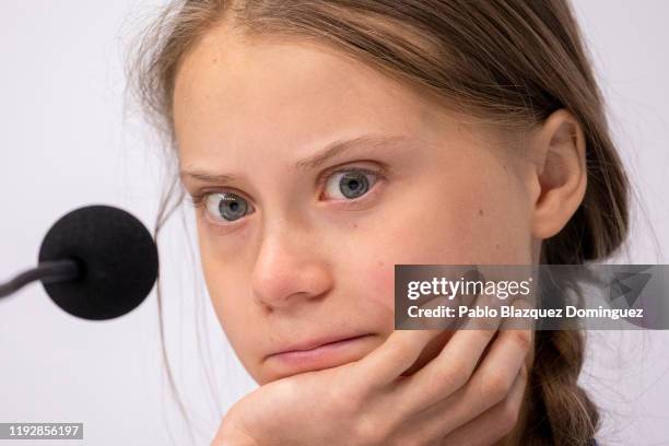 Swedish environment activist Greta Thunberg gestures during a press conference ‘with Fridays For Future movement’ at the COP25 Climate Conference on...