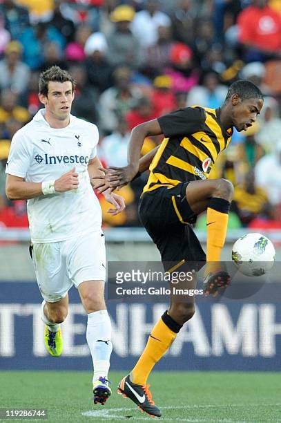 Gareth Bale of Tottenham and Dominic Mateba of Chiefs during the 2011 Vodacom Challenge match between Kaizer Chiefs and Tottenham Hotspur at Peter...