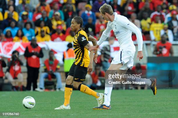 Josta Dladla of Chiefs and Peter Crouch of Tottenham during the 2011 Vodacom Challenge match between Kaizer Chiefs and Tottenham Hotspur at Peter...