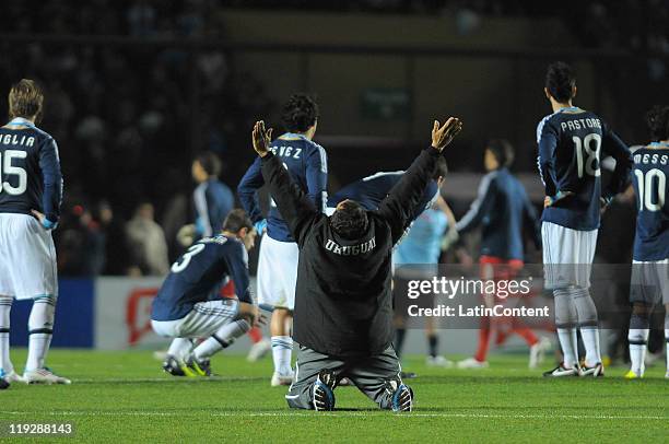 Assitants of Uruguay celebrate after eliminating Argentina in the Penalty shoot out during a match as part of Finals Quarters of 2011 Copa America at...