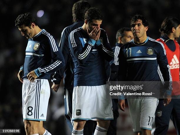 July 16: Javier Zanetti, Gonzalo Higuain and Carlos Tevez, of Argentina, reacts after missing the penalty series against Uruguay during 2011 Copa...