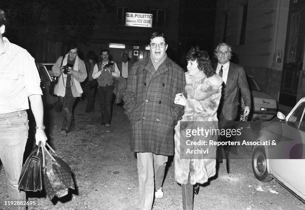 American actor and comedian Jerry Lewis and his wife - the dancer Sandee Pitnick - walking outside the TV studios. Rome, 17th January 1984