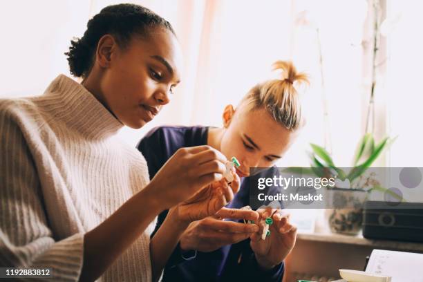 Boy Making Model Kit Model Kit Photos and Premium High Res Pictures - Getty Images