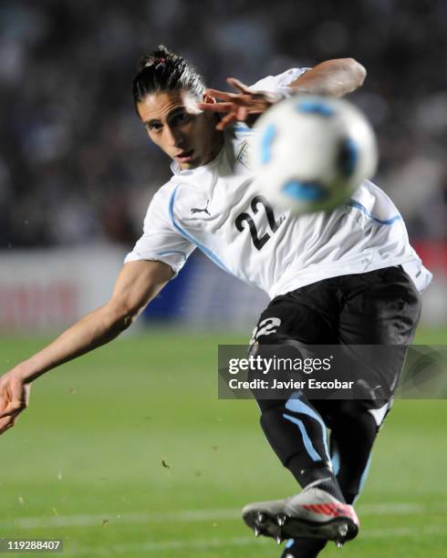 Martín Cáceres of Uruguay kick a penalty during a game between Argentina and Uruguay as part of quarter final of the 2011 Copa America at Brigadier...