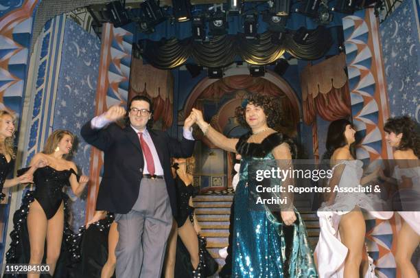 Italian actor Leo Gullotta - as Signora Leonida - dancing with Italian actor and Gianni De Michelis' lookalike Enzo Maria Marzullo in the TV variety...