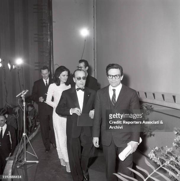 Italian writer and director Pier Paolo Pasolini, Italian director Pietro Germi, Italian actress Lisa Gastoni and Italian actor Totò being awarded...