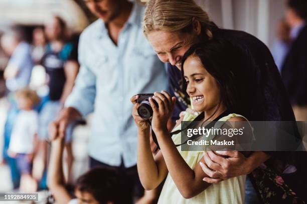 Family Using Filming Camera 1,496 My Life In Four Cameras Stock Photos, High-Res Pictures, and ...