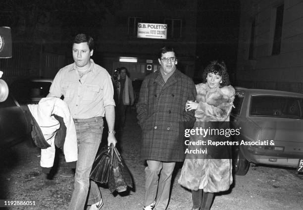 American comic actor Jerry Lewis and his wife, the dancer Sandee Pitnick, walking outside a television studio. Rome, 17th January 1984