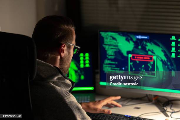 computer hacker - people associated with politics & government stock pictures, royalty-free photos & images