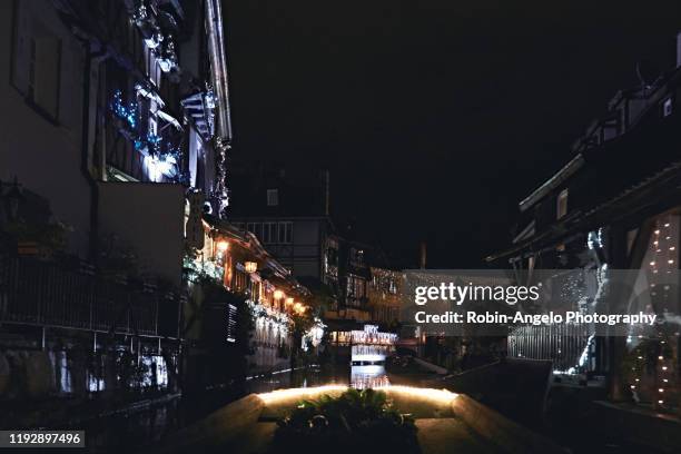 visit colmar on the river in christmas time, alsace, france - robin angelo photography stock pictures, royalty-free photos & images