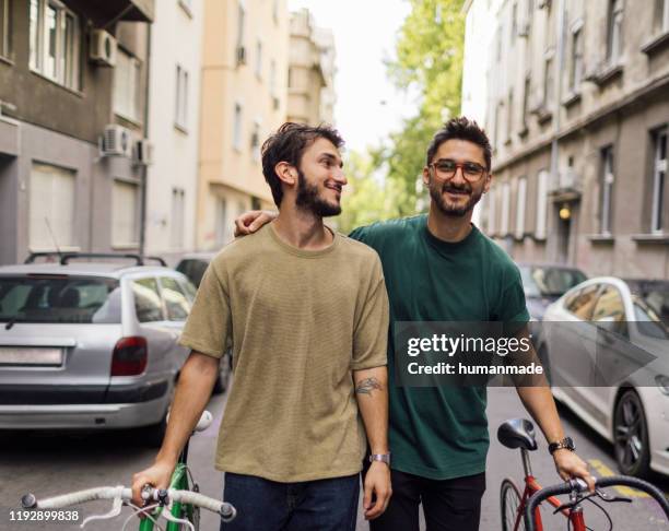 male gay couple - male likeness stock pictures, royalty-free photos & images