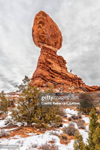 the size of balanced rock - balanced rock arches national park stock pictures, royalty-free photos & images