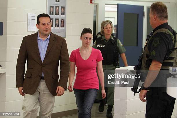 Casey Anthony leaves with her attorney Jose Baez from the Booking and Release Center at the Orange County Jail after she was acquitted of murdering...