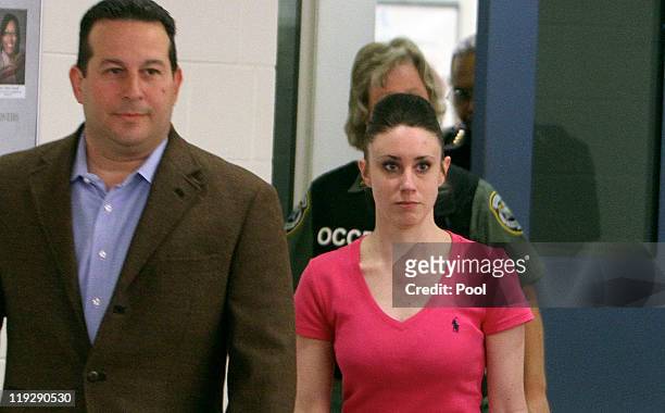 Casey Anthony leaves with her attorney Jose Baez from the Booking and Release Center at the Orange County Jail after she was acquitted of murdering...