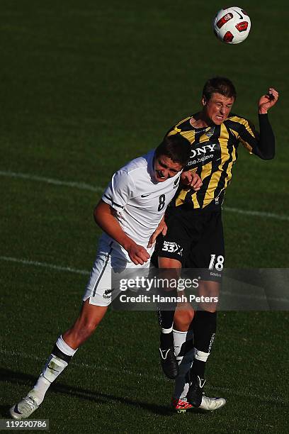 Ethan Galbraith of the Junior All Whites competes with Ben Sigmund of the Phoenix during the pre-season friendly match between the Wellington Phoenix...