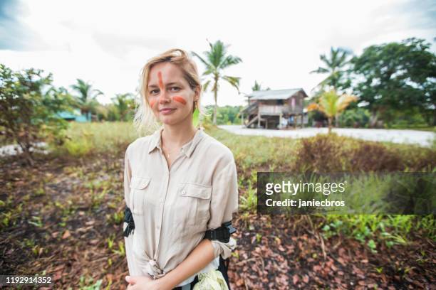 woman tourist in the amerindian village - guyana stock pictures, royalty-free photos & images