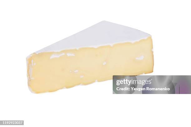 brie cheese isolated on white background - brie stock-fotos und bilder