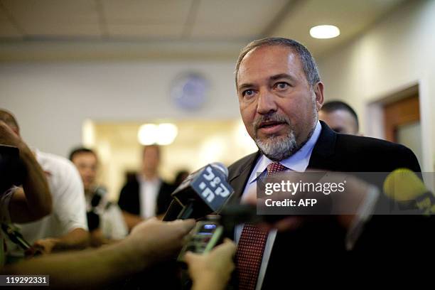 Israeli Foreign Minister Avigdor Lieberman briefs the press before the start of the weekly cabinet meeting in Jerusalem on July 17, 2011. AFP...