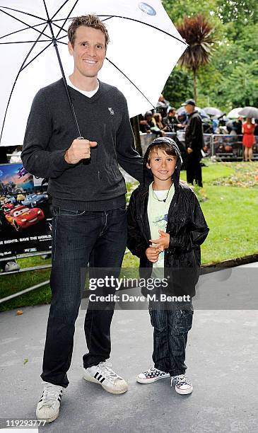 British rower James Cracknell and son Croyde attend a pre-party celebrating the UK Premiere of CARS 2 at Whitehall Gardens on July 17, 2011 in...