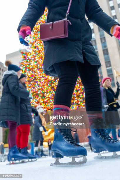 ice skating rockefeller center ice rink - new york rockefeller center ice rink stock pictures, royalty-free photos & images