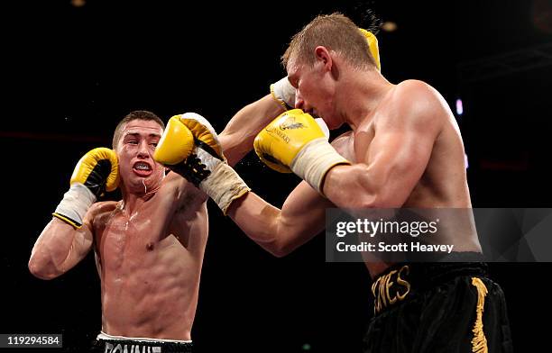 Ronnie Heffron in action during the Welterweight bout with Barrie Jones at Echo Arena on July 16, 2011 in Liverpool, England.