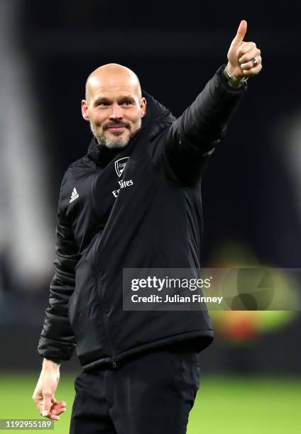 Freddie Ljungberg, Interim Manager of Arsenal acknowledges the fans during the Premier League match between West Ham United and Arsenal FC at London...
