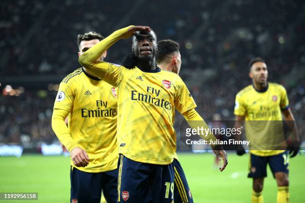 Nicolas Pepe of Arsenal celebrates after scoring his sides second goal during the Premier League match between West Ham United and Arsenal FC at...