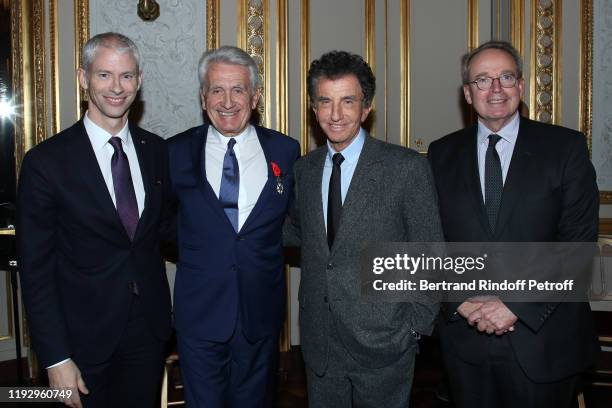 French Minister of Culture Franck Riester, Gilbert Coullier, Jack Lang and Renaud Donnedieu de Vabres attend Gilbert Coullier Receives The "Officer's...