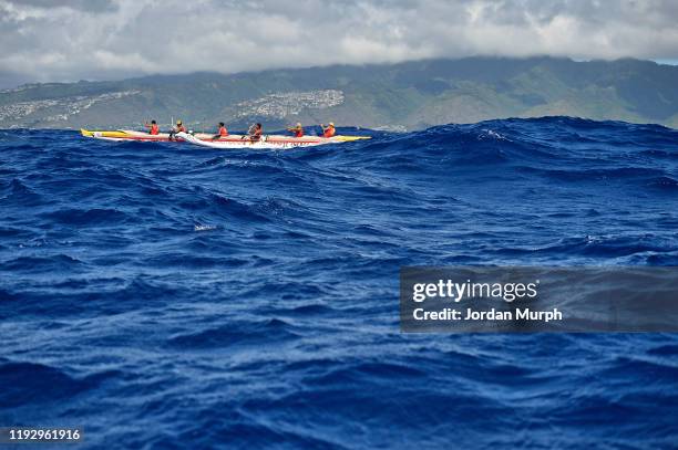 67th Molokai Hoe Outrigger Canoe Race: Red Bull Wa'a Team in action during race at Kaiwi Channel. Molokai, HI CREDIT: Jordan Murph