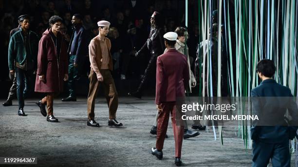 Models present creations for Ermenegildo Zegna during the men's fall/winter 2020/21 fashion collections in Milan on January 10, 2020.