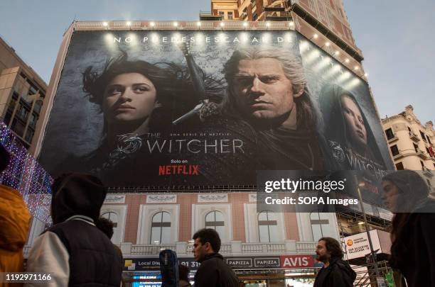 Large American global on-demand Internet streaming media provider Netflix and Witcher tv-show advertisement seen in Spain.