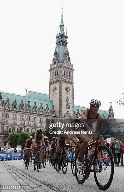 Svenja Bazlen of Germany cycles in front of the Hamburg town hall during the Women Elite Dextro Energy Triathlon ITU World Championship on July 17,...