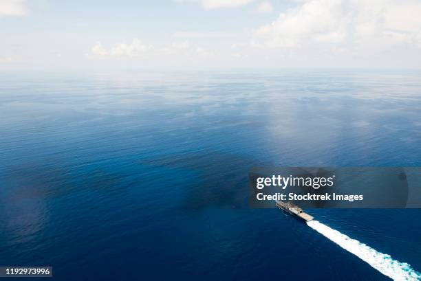 uss fort worth conducts patrols in the south china sea near the spratly islands. - uss monitor stock pictures, royalty-free photos & images