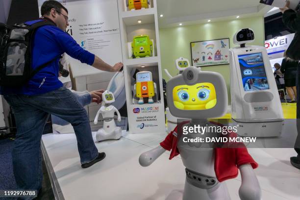 Toki robots, by Hancom Robotics, are displayed at the 2020 Consumer Electronics Show in Las Vegas, Nevada on January 10, 2020. - CES is one of the...