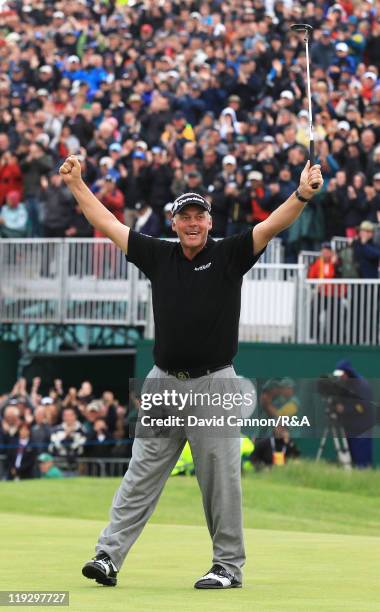 Darren Clarke of Northern Ireland celebrates victory on the 18th green during the final round of The 140th Open Championship at Royal St George's on...