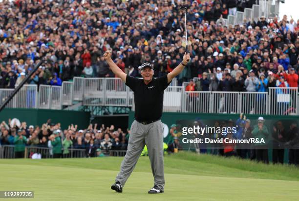 Darren Clarke of Northern Ireland celebrates victory on the 18th green during the final round of The 140th Open Championship at Royal St George's on...